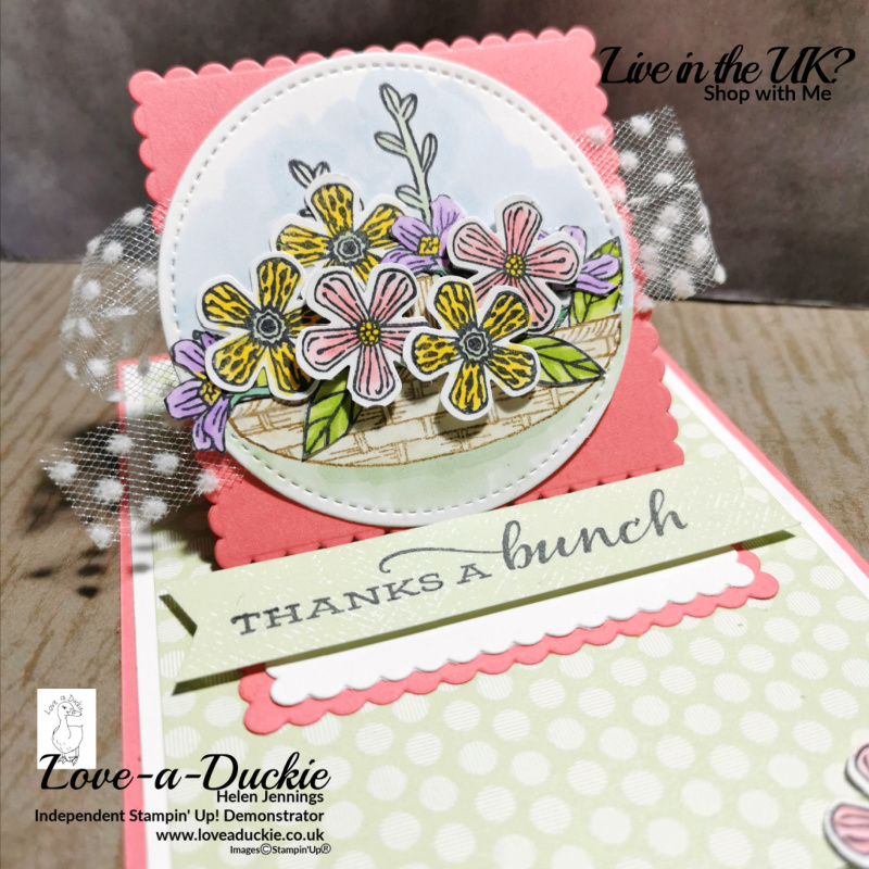 A mini easel card on a flat base in this fun fancy fold card.