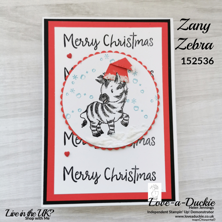 A Christmas card featuring the Zany Zebra stamp set and embossing paste