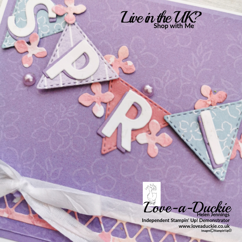 The Hydrangea Hill patternrd papers were featured in this spring banner card, die cut with the stitched triangles.