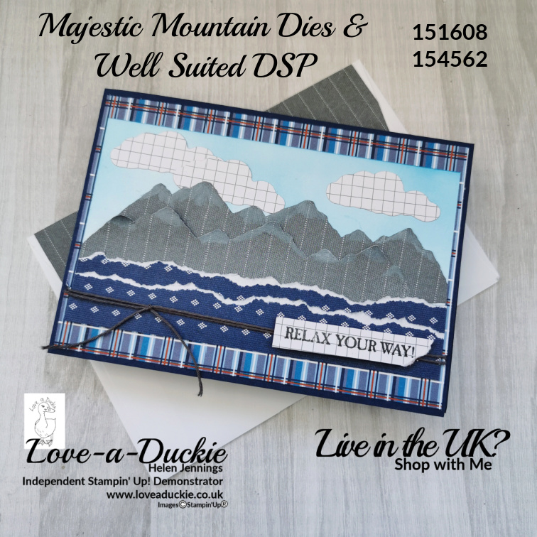 Die cut and torn patterned paper are used to create a mountain scene for this masculine card.