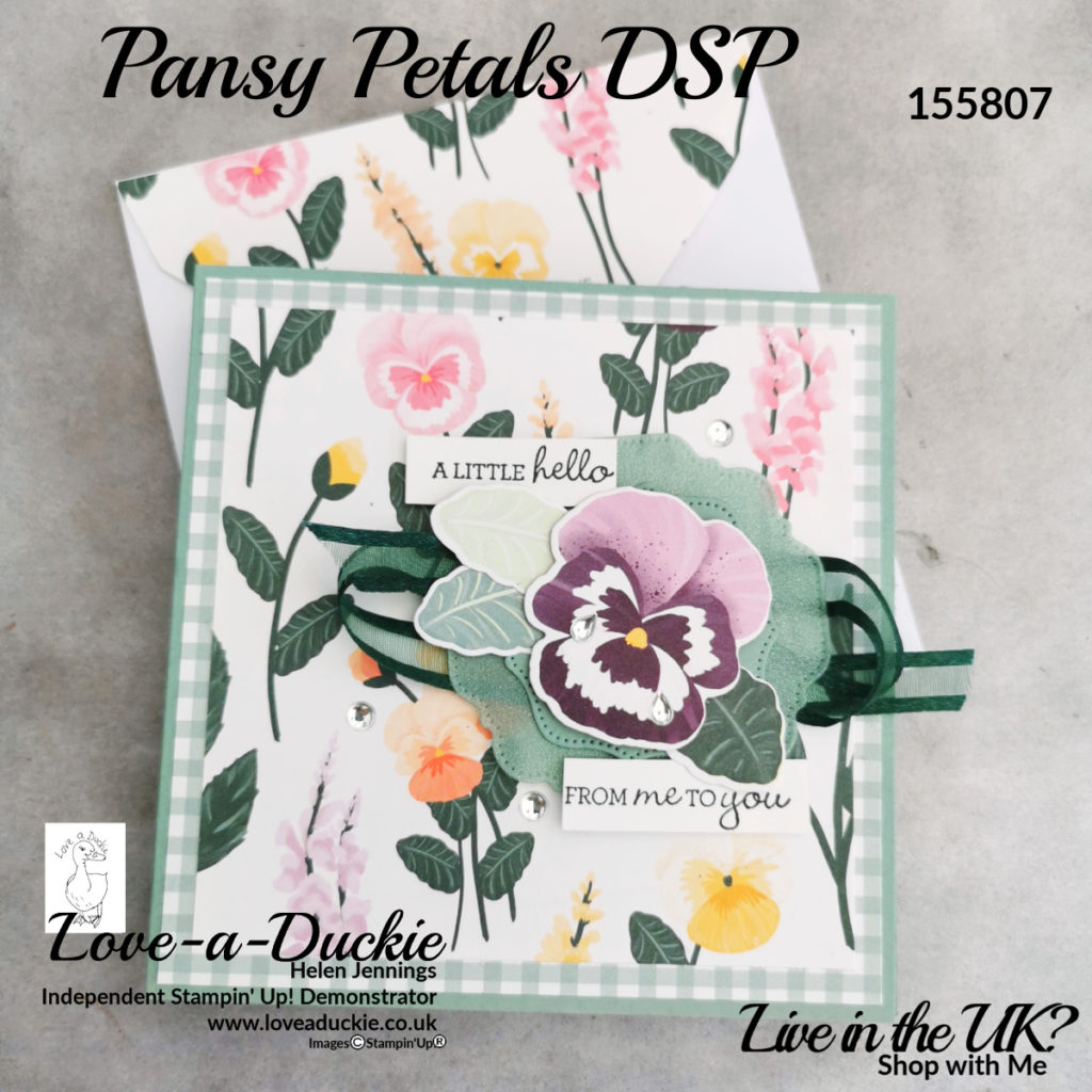 A card and matching envelope have been created with Stampin' Up's Pansy petal Designer series paper.