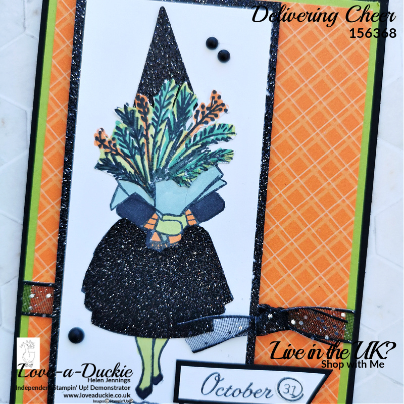 Stampin' Up's Black Glitter card and black glitter ribbon add sparkle to this witch on the Halloween card