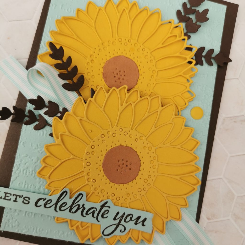 The timeworn Type 3D embossing folder from Stampin' Up is used for the background of this sunflower card created for a Colour Challenge.