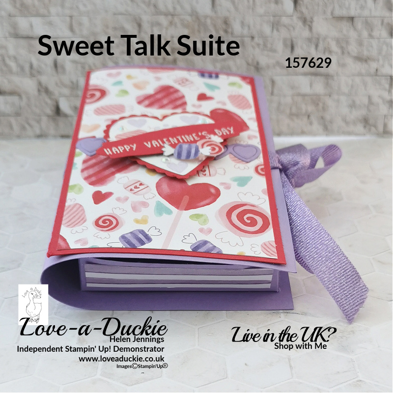 Punched hearts decorate this faux book treat box using products from Stampin' Up