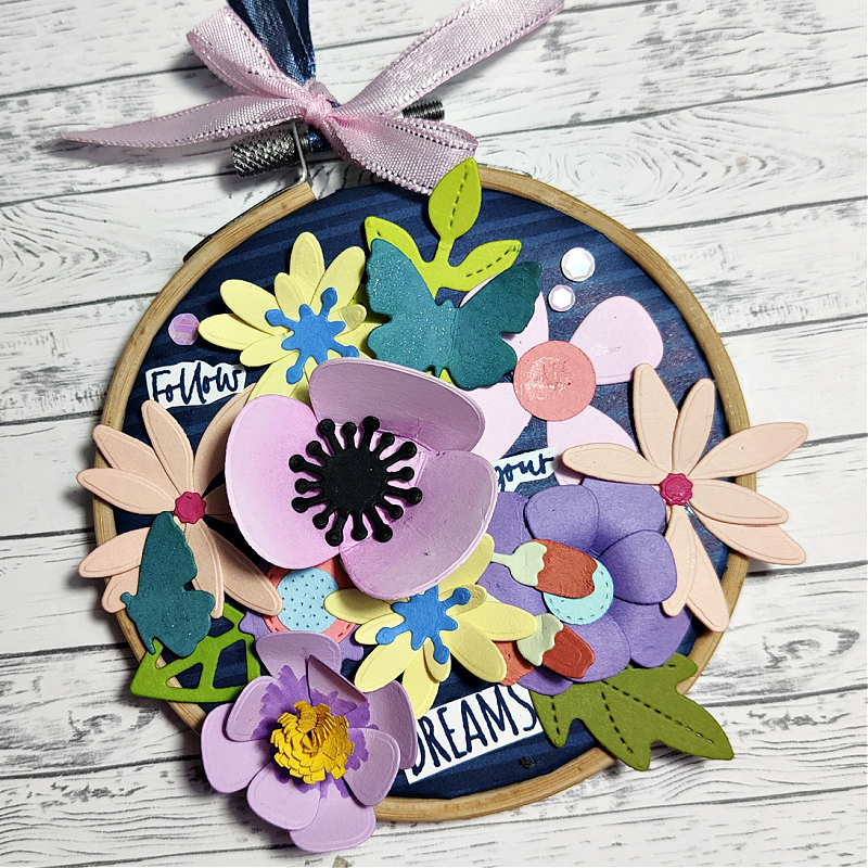 A floral wall hanging using an embroidery hoop and the Paper Florist dies from Stampin' Up!