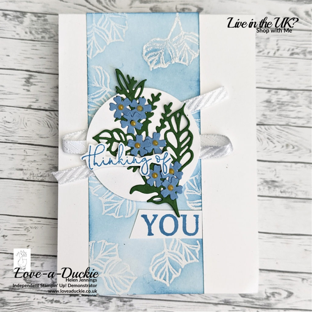 An emboss resist panel and forget me nots of this thinking of you card.