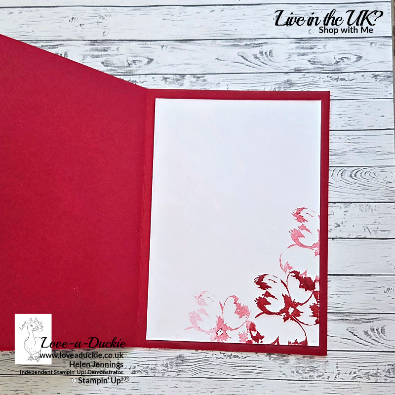 Inside view of coordinating monochromatic red handmade card with simple stamped floral detail and clean layout.